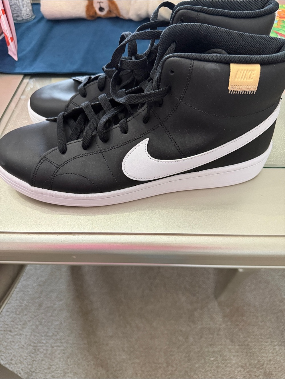 Nike Black High-Top Sneakers with White Swoosh